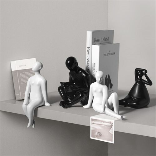 Monochrome Ceramic Human Figurines