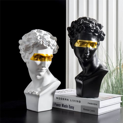 Punk David Gypsum Head Statue has a single stripe of golden paint across the eyes of the statue that gives it a nordic appearance.